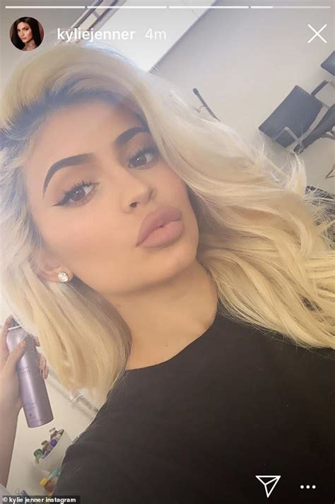 Kylie Jenner wears nothing but bra and blonde wig in late night 